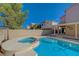 Gorgeous pool and spa with integrated spa and patio, perfect for relaxing and entertaining at 1163 Tumbling River Ave, Henderson, NV 89052