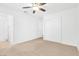 Bedroom featuring plush carpet, sliding door closet and white walls at 1216 Maserati Dr, Las Vegas, NV 89117