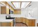 Bright kitchen featuring stainless steel appliances, white countertops and light-colored cabinets at 1216 Maserati Dr, Las Vegas, NV 89117