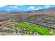 Aerial view of the community featuring green spaces and mountain views at 12541 Lylan Ridge St, Las Vegas, NV 89138