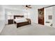 Spacious bedroom with a king-size bed, sliding barn door, and walk-in closet at 12541 Lylan Ridge St, Las Vegas, NV 89138