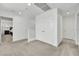 Carpeted hallway with white trim and doors at 12541 Lylan Ridge St, Las Vegas, NV 89138