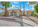 Community clubhouse featuring well-maintained landscaping and convenient parking at 1541 Linnbaker Ln # 202, Las Vegas, NV 89110