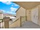 Home entrance features a secure porch with a gated doorway, providing security and charm at 1541 Linnbaker Ln # 202, Las Vegas, NV 89110