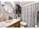 Cozy bathroom featuring a sink, toilet, shower/tub, and modern fixtures at 181 Lido Cir, Henderson, NV 89015