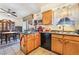 Kitchen area complemented by tile floors, and breakfast nook for casual dining at 181 Lido Cir, Henderson, NV 89015