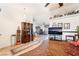 Open living area with a ceiling fan and neutral tones, seamlessly connecting to dining space at 181 Lido Cir, Henderson, NV 89015