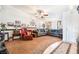 Spacious living room with carpet flooring, a ceiling fan, and neutral color palette at 181 Lido Cir, Henderson, NV 89015