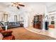 Bright living room with a ceiling fan and tile flooring at 181 Lido Cir, Henderson, NV 89015