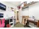 Functional office space featuring a desk, shelving, and natural light for productivity at 181 Lido Cir, Henderson, NV 89015