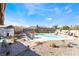 Outdoor pool with a seating area and landscaping at 181 Lido Cir, Henderson, NV 89015