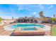 Backyard pool and spa with lush green landscaping at 181 Lido Cir, Henderson, NV 89015