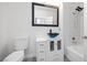 Bathroom featuring stylish blue vessel sink, modern vanity, shower, and toilet at 1830 N Buffalo Dr # 1019, Las Vegas, NV 89128