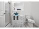 Bathroom featuring stylish blue vessel sink, modern vanity, shower, and toilet at 1830 N Buffalo Dr # 1019, Las Vegas, NV 89128