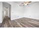 Empty room with wood-look floors and white walls at 1830 N Buffalo Dr # 1019, Las Vegas, NV 89128