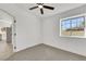 Bedroom with ceiling fan and window at 1905 Joella St, Las Vegas, NV 89108