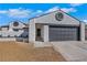 One-story home with a two-car garage, well-kept lawn, and a white exterior at 1905 Joella St, Las Vegas, NV 89108