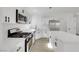 Bright modern kitchen featuring stainless appliances, an island and white cabinets at 1905 Joella St, Las Vegas, NV 89108