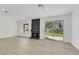 Living room showcasing a modern fireplace and sliding glass doors to the backyard at 1905 Joella St, Las Vegas, NV 89108