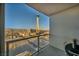 Balcony view showcasing the Stratosphere Tower, city skyline, and mountain backdrop at 200 W Sahara Ave # 1711, Las Vegas, NV 89102