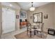 Relaxing dining area featuring modern furniture and a stylish mirror at 200 W Sahara Ave # 1711, Las Vegas, NV 89102