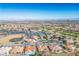 Breathtaking aerial view of a Primary-planned community, featuring tennis courts, golf course, and baseball field at 2265 Lauren Dr, Las Vegas, NV 89134