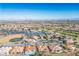 Overhead view featuring community amenities with a golf course, baseball field, tennis courts and housing at 2265 Lauren Dr, Las Vegas, NV 89134