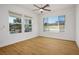Bright bedroom with windows and modern ceiling fan at 2265 Lauren Dr, Las Vegas, NV 89134