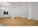 Bright foyer features hardwood flooring and a view of the home's entry at 2265 Lauren Dr, Las Vegas, NV 89134