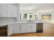 Modern kitchen featuring stainless steel appliances, white cabinets, and a wine cooler at 2265 Lauren Dr, Las Vegas, NV 89134