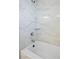 Shower and tub with white marble style tile surround and chrome hardware at 2265 Lauren Dr, Las Vegas, NV 89134