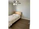 Bright bedroom with ceiling fan, wood floors and natural light at 231 W Horizon Ridge Pkwy # 514, Henderson, NV 89012