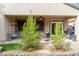 Relax on the covered patio while enjoying the desert landscaping and natural surroundings in the backyard at 2392 Mystic Star St, Henderson, NV 89044