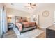 Serene bedroom featuring a decorative bed frame and hardwood floors, with a neutral color palette at 2392 Mystic Star St, Henderson, NV 89044