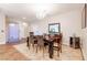 Dining room featuring a modern chandelier, large mirror, and unique water feature at 2392 Mystic Star St, Henderson, NV 89044