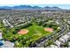 Expansive community park with baseball fields, and lush landscaping, set against a backdrop of scenic mountain views at 2597 Belgreen St, Las Vegas, NV 89135