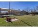 Outdoor park featuring a horseshoe pit and covered seating area on a sunny day at 2921 Hayden Creek Ter, Henderson, NV 89052