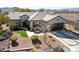 Beautiful single-story home featuring desert landscaping, a tile roof, and a two-car garage at 2921 Hayden Creek Ter, Henderson, NV 89052