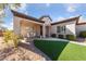 Charming front porch with seating and manicured landscaping, perfect for relaxing at 2921 Hayden Creek Ter, Henderson, NV 89052