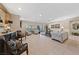 Spacious living room with ample natural light, tile floors, and stylish furnishings at 2921 Hayden Creek Ter, Henderson, NV 89052