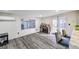 Bright living area adjacent to the kitchen, featuring modern flooring and ample natural light at 321 Agora Way, Las Vegas, NV 89110