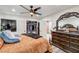 Stylish main bedroom featuring a dresser, walk-in closet, and wood-look flooring at 321 Agora Way, Las Vegas, NV 89110