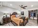 Cozy main bedroom featuring a large closet and a bed with dark wood frames at 321 Agora Way, Las Vegas, NV 89110