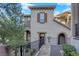 Charming townhome with a private entrance, wrought iron fencing, and tile roof at 41 Via Verso Lago, Henderson, NV 89011