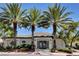 Exterior of a well-maintained clubhouse with palm trees and inviting entrance at 420 Blush Creek Pl, Las Vegas, NV 89144