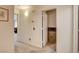 Bright hallway with neutral tones, leads to a room and the bathroom at 420 Blush Creek Pl, Las Vegas, NV 89144