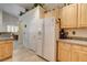 View of the kitchen with stainless appliances, granite countertops, and adjacent dining area at 420 Blush Creek Pl, Las Vegas, NV 89144