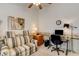 The room is currently staged as a home office and has a sofa at 420 Blush Creek Pl, Las Vegas, NV 89144