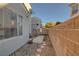 Private backyard with rock and stone landscaping, enclosed with a block wall at 4833 Integrity St, North Las Vegas, NV 89031