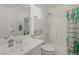 Clean bathroom with shower-tub combo, vanity, and decorative touches at 4833 Integrity St, North Las Vegas, NV 89031